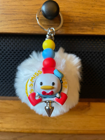 Character keychains with pom pom